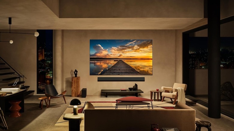 A TV mounted on a wall in a living room