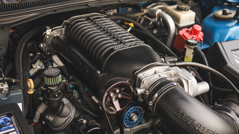 A close-up of a GM LS engine with a Whipple supercharger.