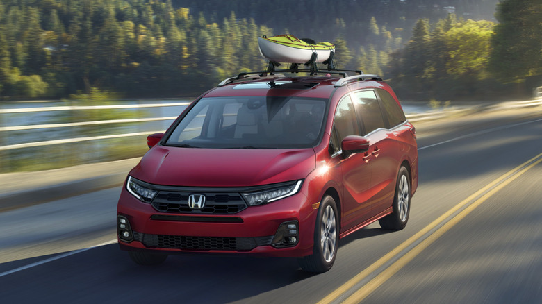 Front view of Honda Odyssey minivan driving on road