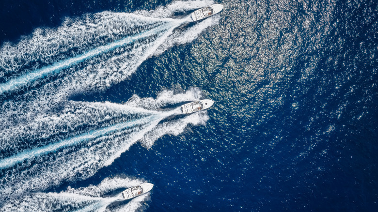 Aerial view of motorboats cruising at high speed