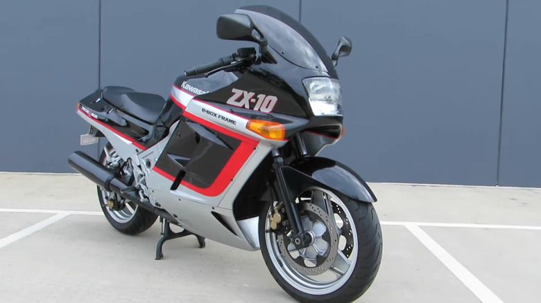 Kawasaki's first-generation ZX-10 p-parked infront of a garage