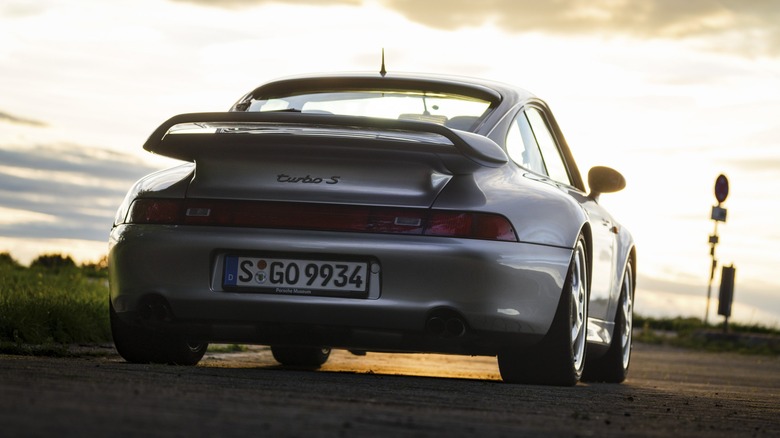 1998 Porsche 993 Turbo S, rear view, parked at sunset on road