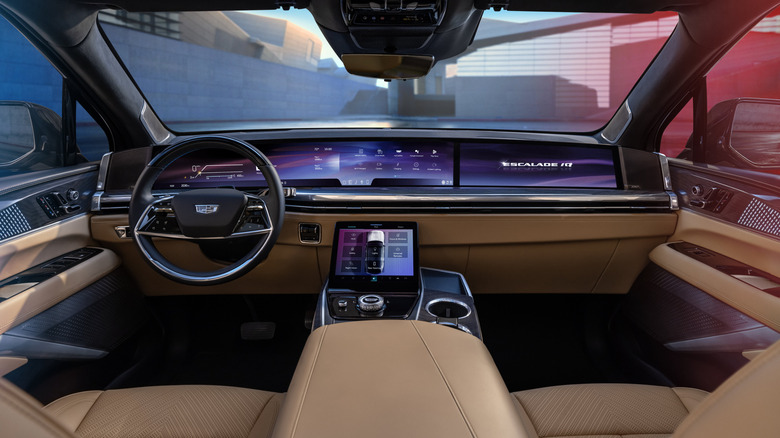 2025 Cadillac Escalade IQ interior dashboard with a large 55-inch widescreen display