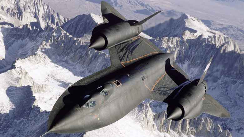 SR-71 flying over mountains