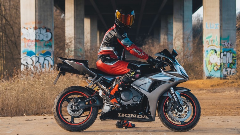 Motorcycle rider with a tinted visor