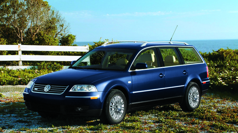 VW Passat W8 estate parked in a field