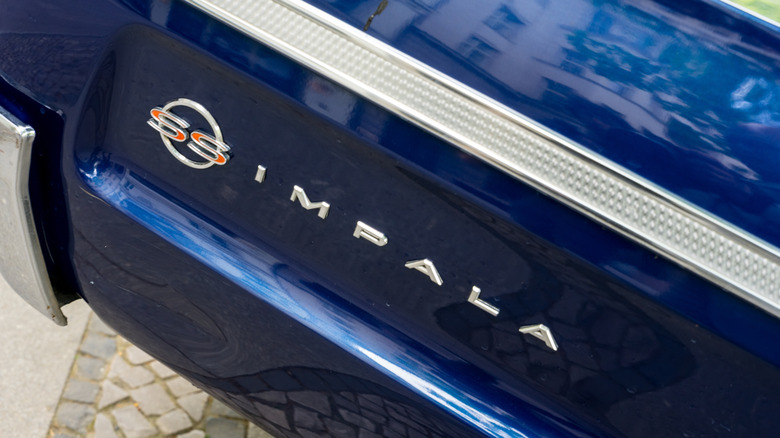 Badge on a dark blue 1960s Impala SS