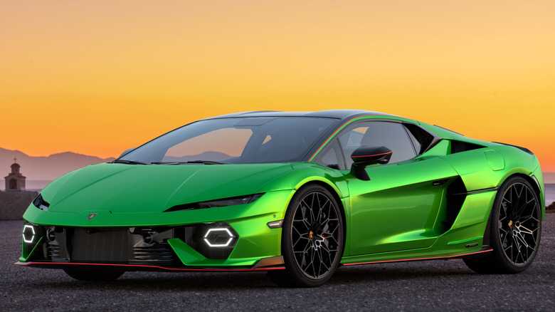 A bright green 2026 Lamborghini Temerario supercar parked outside during sunset.