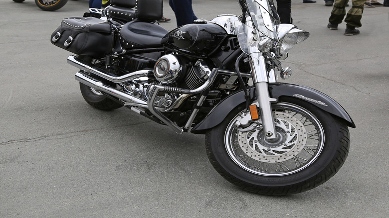 Motorcycle cruiser Yamaha V-Star 650 Classic parked at the moto show.