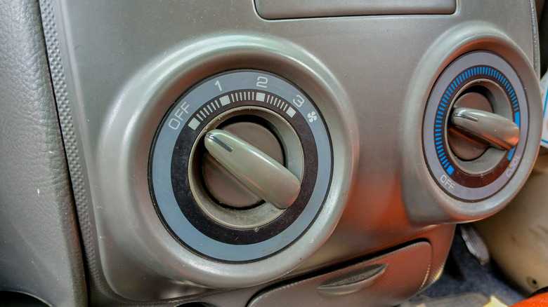 Manual air conditioner control inside a car's cabin