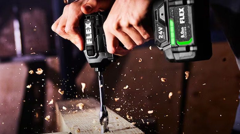 person using flex drill