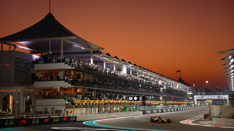 A shot of Lando Norris driving at the Yas Marina Circuit