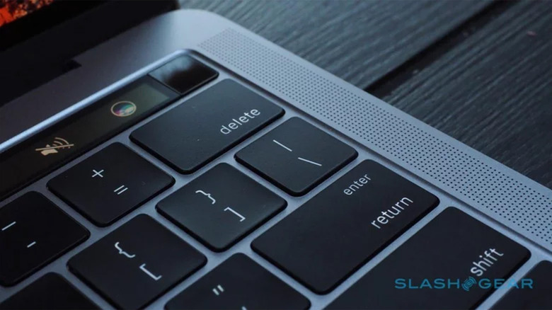 A close up photograph of an Apple MacBook keyboard