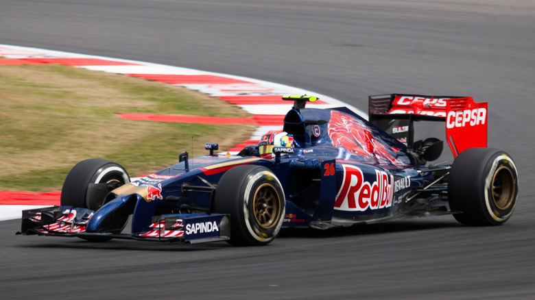 Danil Kvyat in Toro Rosso STR9 at 2014 British Grand Prix