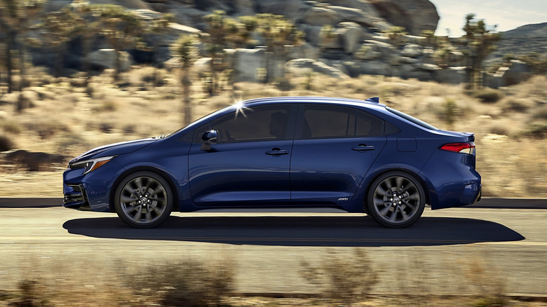 Side view of 2025 Corolla Hybrid in desert