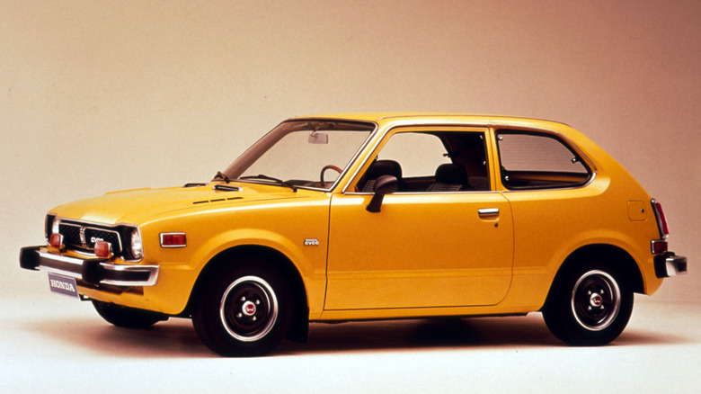 Side view of orange first-generation Honda Civic