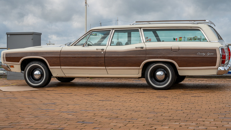 A Vintage Coutnry Squire station wagon parked