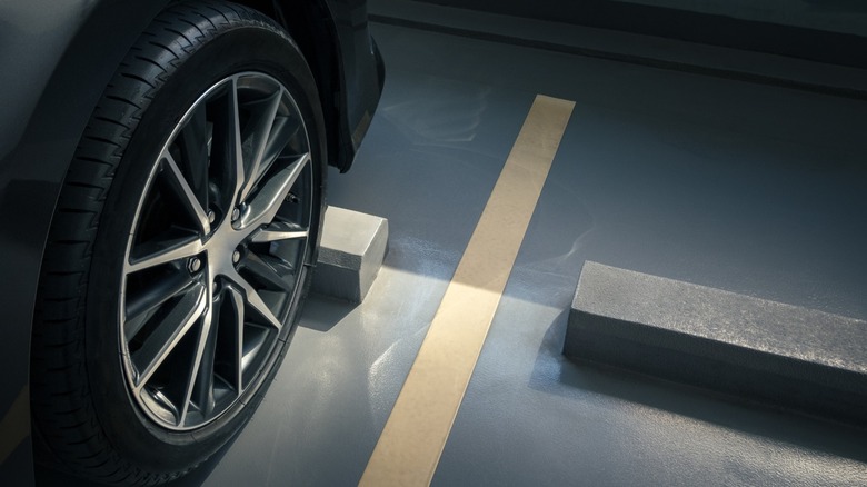 a car parking within the designated lines