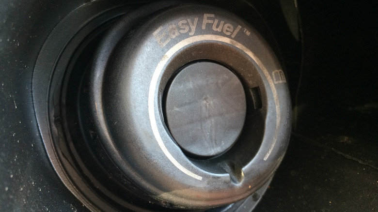 A close up of a gas cap on a Ford Escape