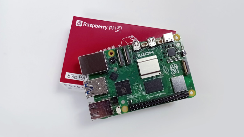 Raspberry Pi 5 with box on top of table