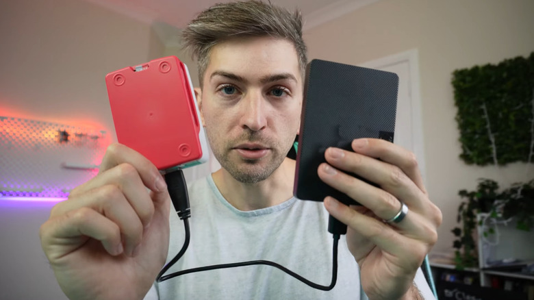 TechWithDavid holding up Raspberry Pi and external hard drive to camera