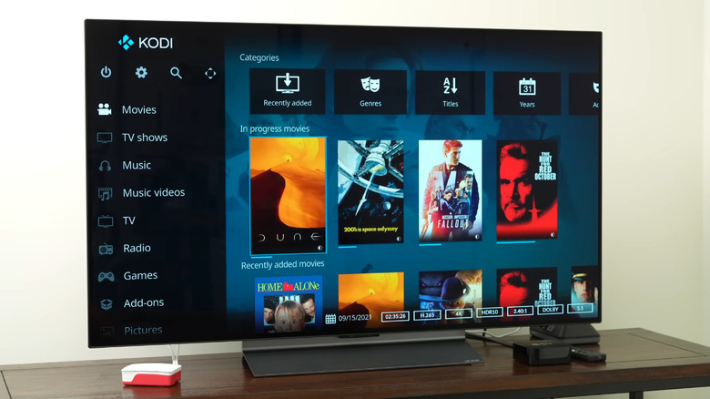 TV with Kodi Media Player and Raspberry Pi streaming box beneath it