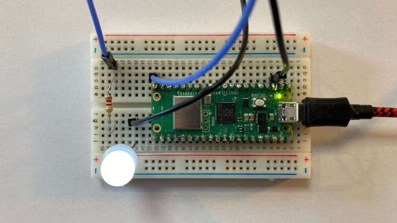 An LED showing a Raspberry Pi Picoo W is on, and talking to a network.