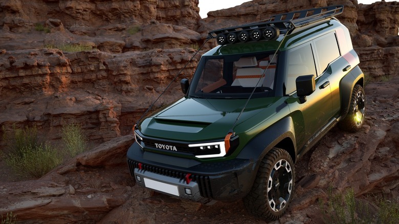 Toyota Compact Cruiser EV off-roading on a mountain