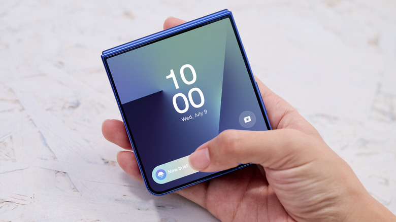 A lifestyle image of a person using the Galaxy Z Flip7 cover screen