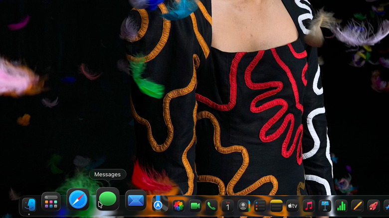 Liquid Glass effect on the taskbar of macOS Tahoe