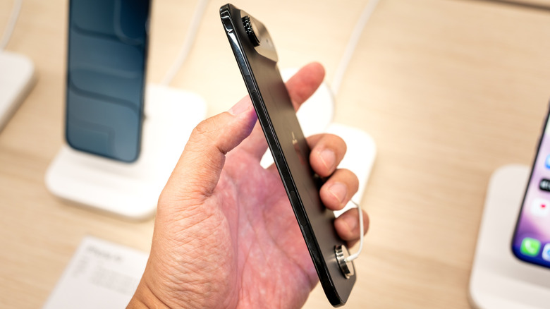 Man holding iPhone Air