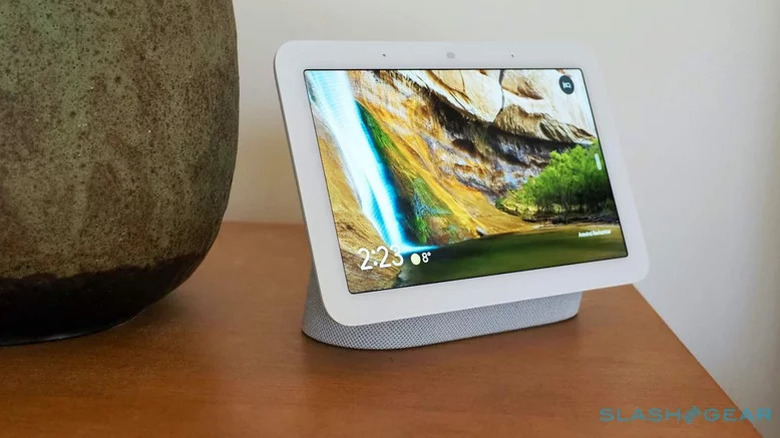 A secong gen Google Nest Hub on a bedside table