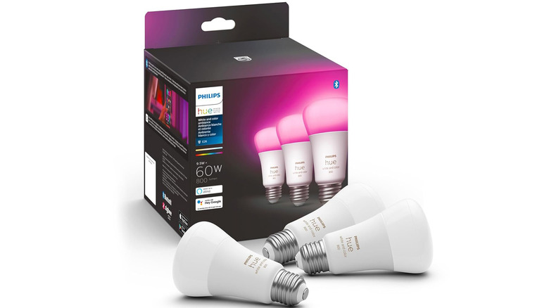 Three Philips Hue lightbulbs with the packaging