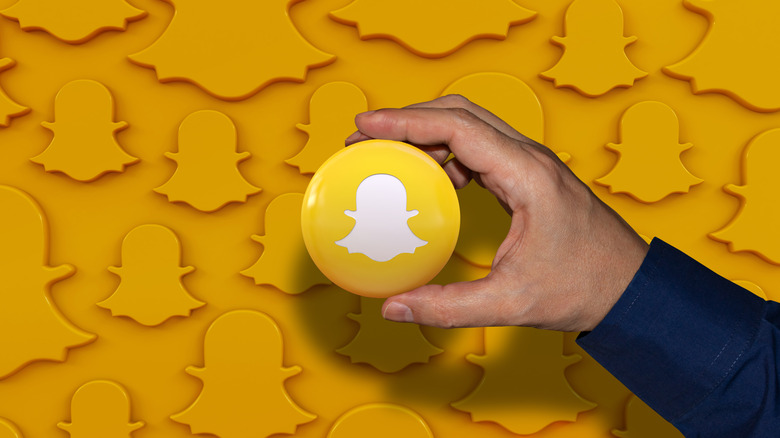 Person using Snapchat on smartphone