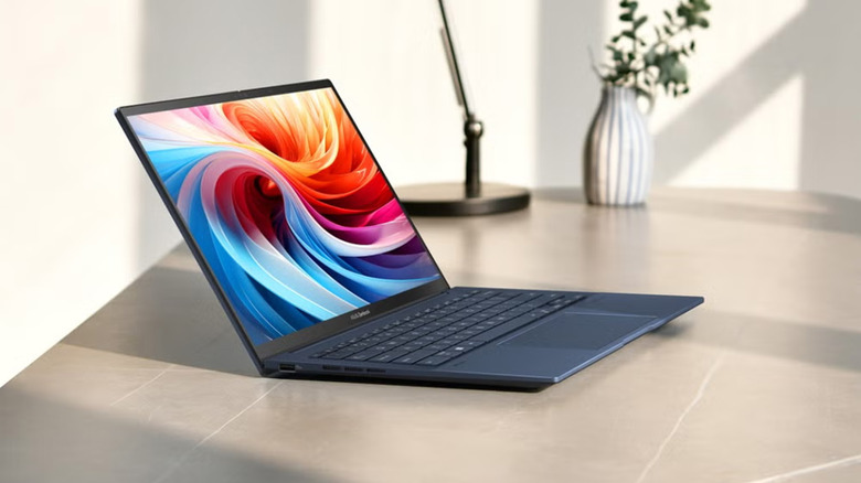 An Asus laptop sitting on a desk