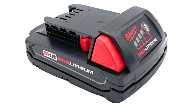 Milwaukee red and black charger on a white background