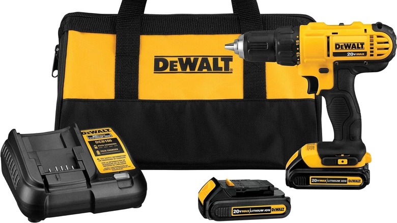 DeWalt cordless drill with battery, charging station, and bag