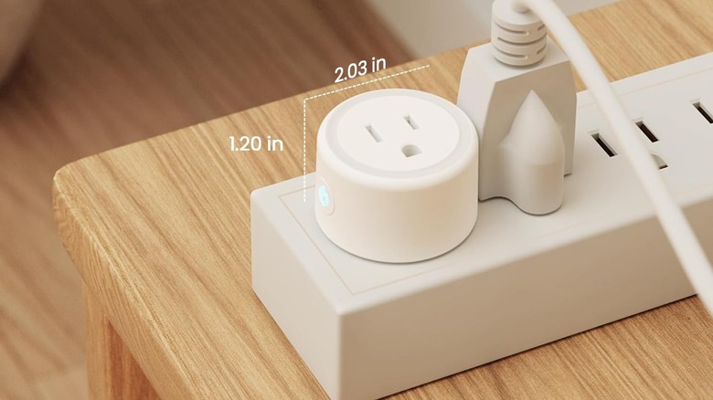 A smart plug inside of an outlet.