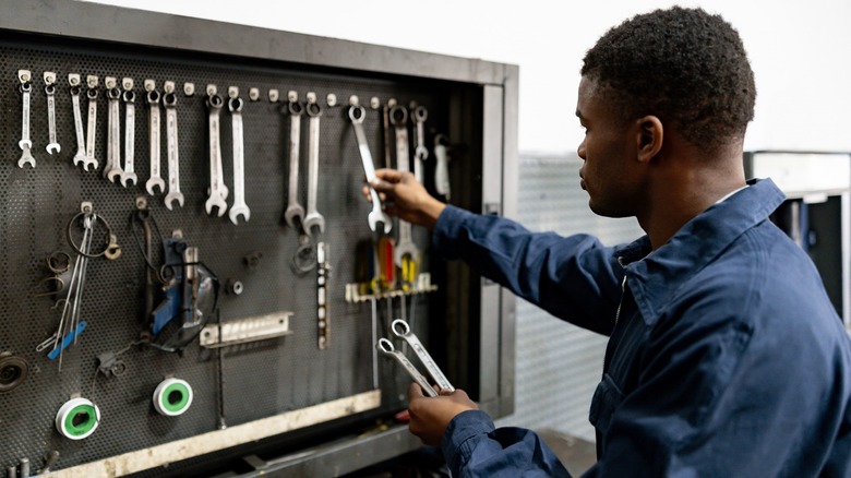 Person organizing tools