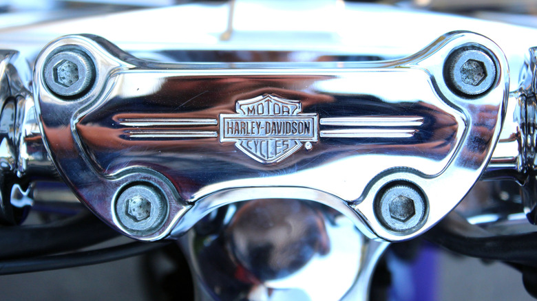 Harley-Davidson chrome handlebar with an engraved logo
