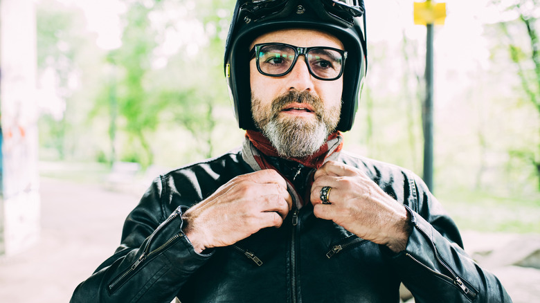 man wearing glasses with helmet