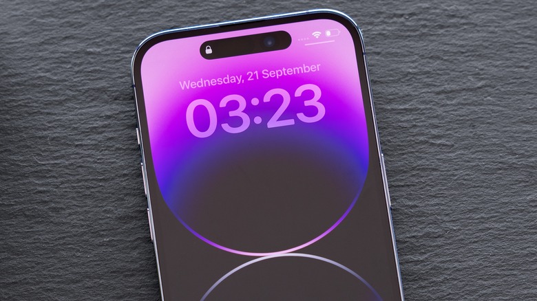 two iphones near boxes
