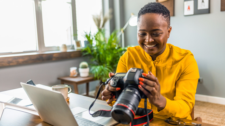 Girl checking photos on DSLR