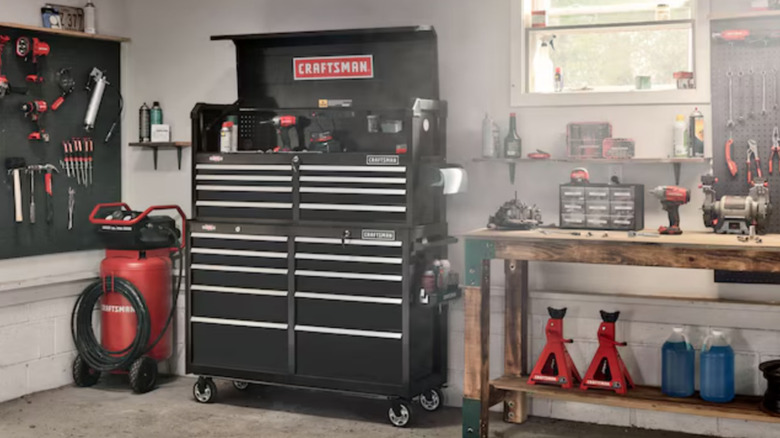 Craftsman rolling tool cabinet on display in garage with assorted tools