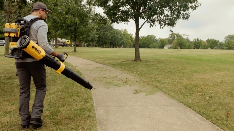 DeWalt 60V Max Cordless Backpack Blower in use