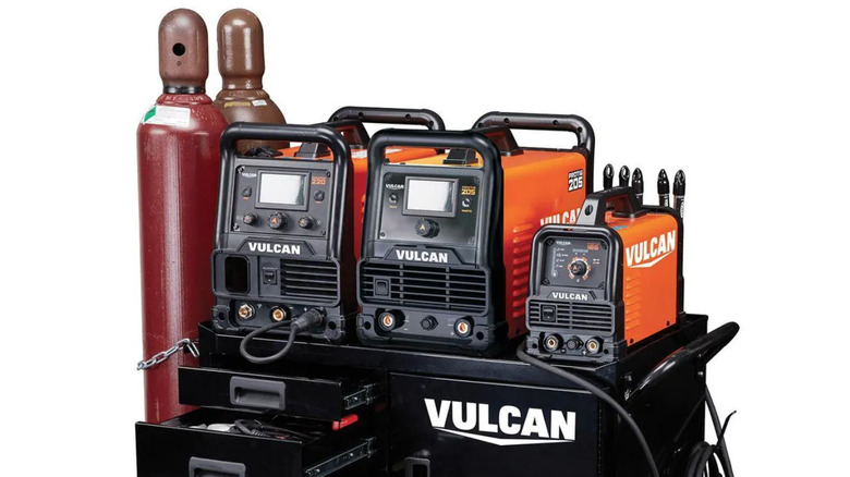 Vulcan welding cabinet with welding tools and equipment on board against white background