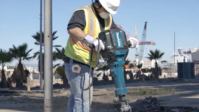 Makita 70-lb Advanced AVT Breaker Hammer in use