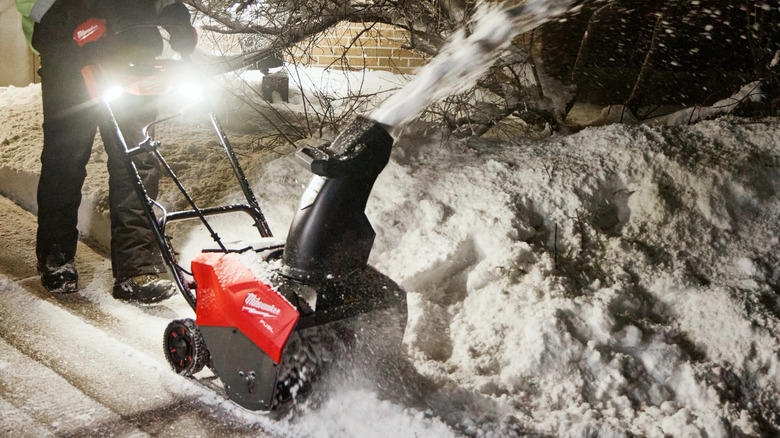 Milwaukee snow blower used at night