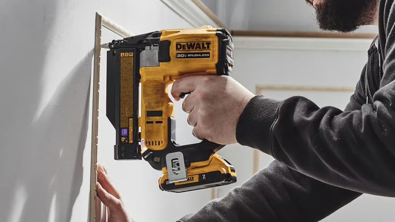 Atomic 20V Max 23-ga Pin Nailer in use