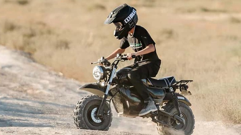 Rider off-roading with a Drift Hero 212 cc Gas Mini Bike